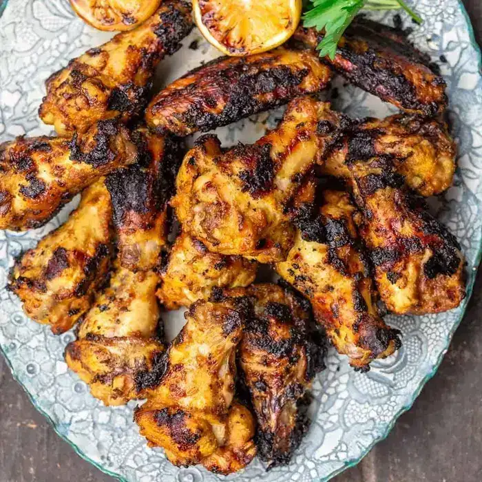 Куриные крылышки с зирой, лимоном и чесноком